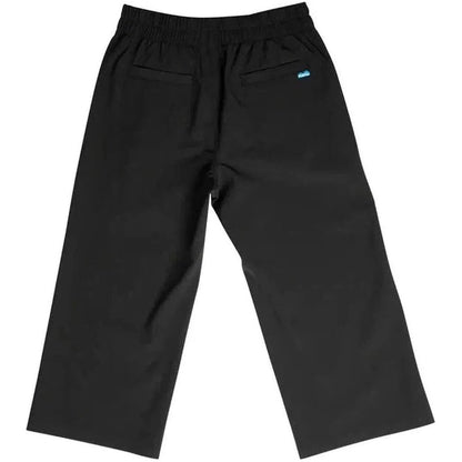 Back view of the Kavu Women's La Ticia in Black showing the elastic waistband and back pocket with a small logo on the right pocket against a white background.