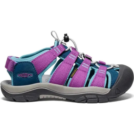 Side view of the Keen Youth's Newport Boundless in Legion Blue/Willowherb showing the lugged outsole against a white background.