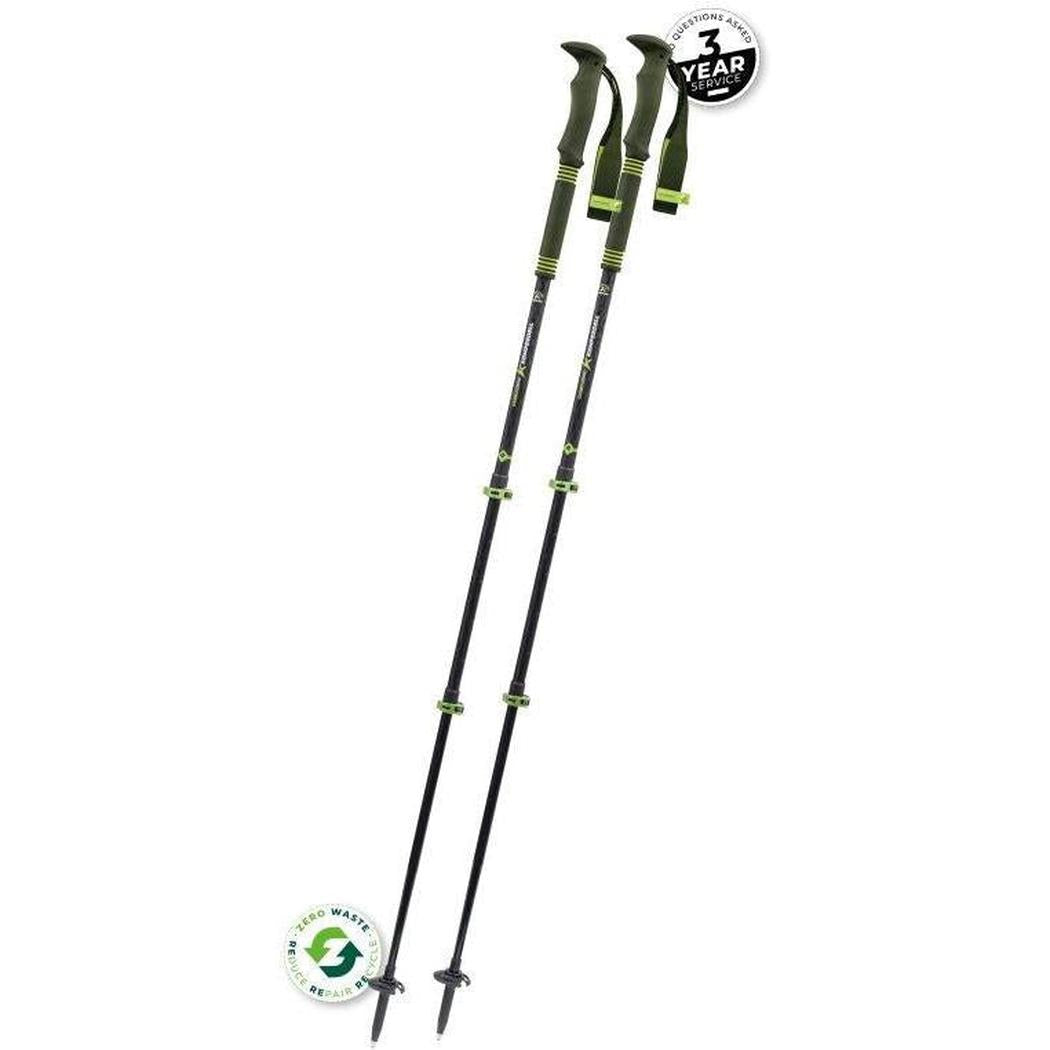 Two Komperdell Carbon PRO ZERO trekking poles with green accents, shown from a side angle against a white background, featuring a 3-year warranty badge.
