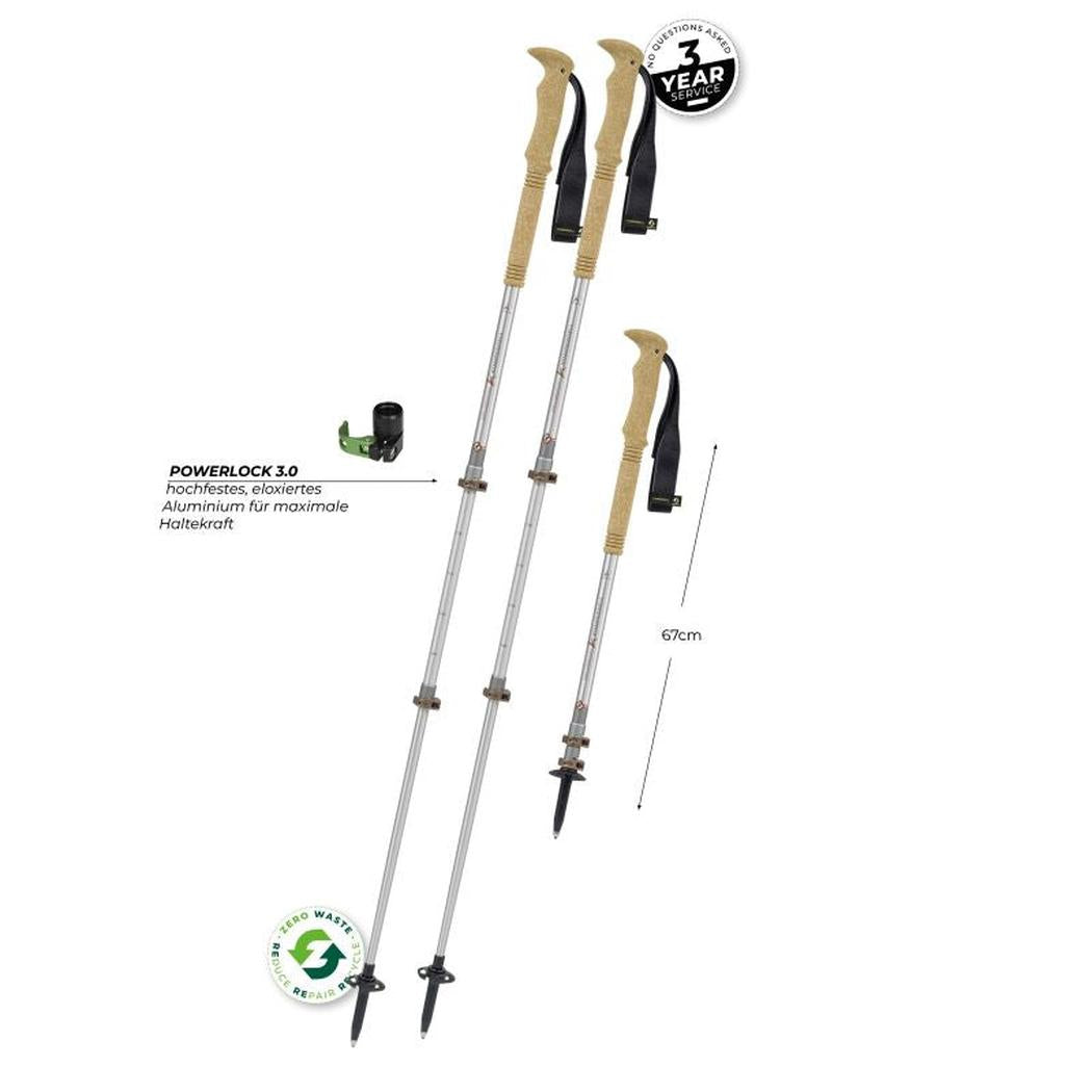 Two Komperdell Explorer Zero Cork trekking poles with tan handles and black straps, shown in a side view against a white background, featuring the Powerlock 3.0 mechanism and 67cm length.