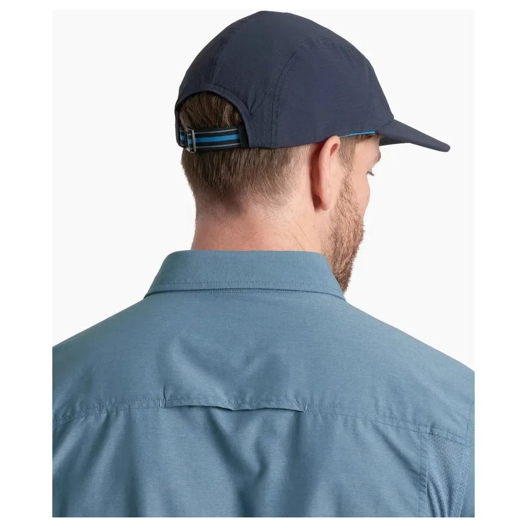 Back view of the Kuhl Breeze Cap in Pirate Blue on a man wearing a blue shirt against a white background.
