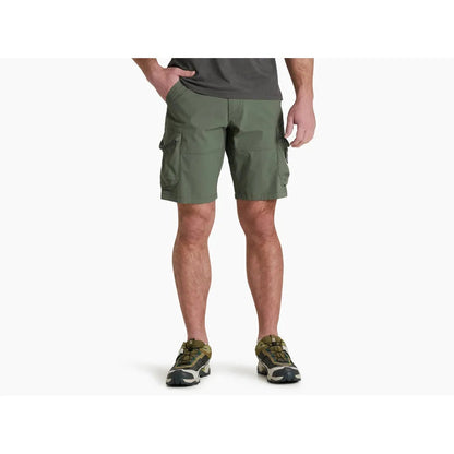 A front view of the Kuhl Men's Ambush Cargo shorts in Ambush Cargo color, showing the cargo pockets and a model wearing them against a white background.