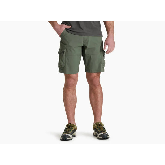 A front view of the Kuhl Men's Ambush Cargo shorts in Ambush Cargo color, showing the cargo pockets and a model wearing them against a white background.