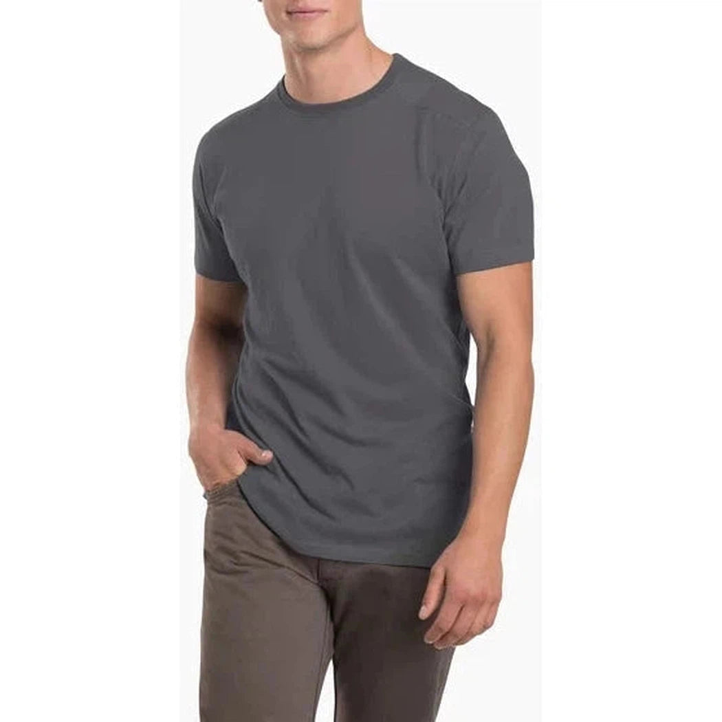 A front view of the Kuhl Men's Bravado Carbon tee on a model with a white background.