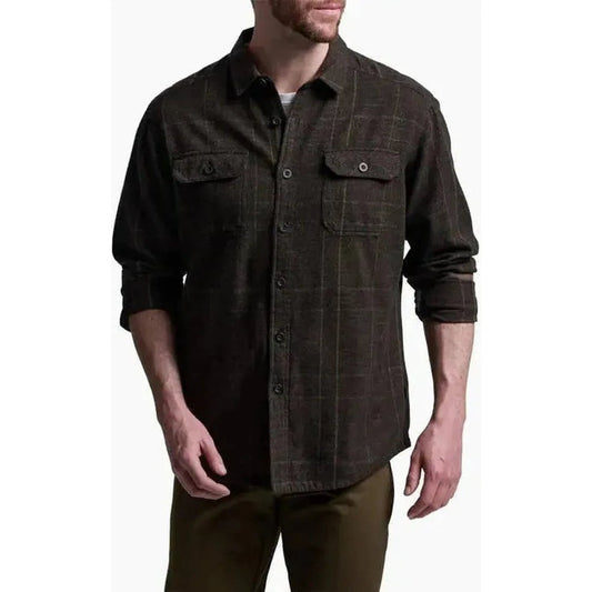 A front view of the Kuhl Men's Deviatr Shirt-Jac in Dark Roast showing chest pockets and rolled sleeves against a white background.