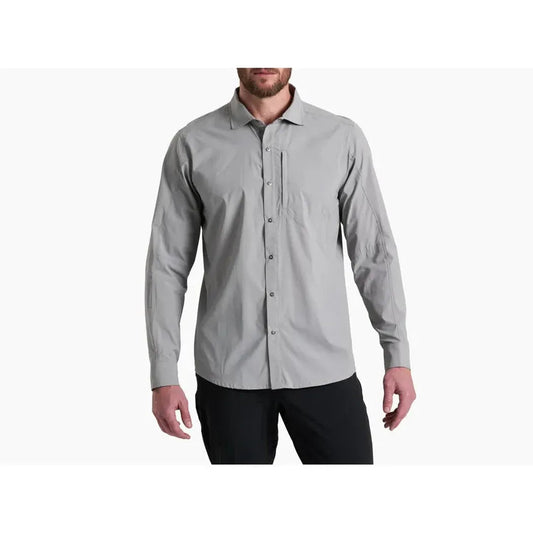 A front view of the Kuhl Men's Driftr Long Sleeve in Concrete Grey on a model wearing black pants against a white background.