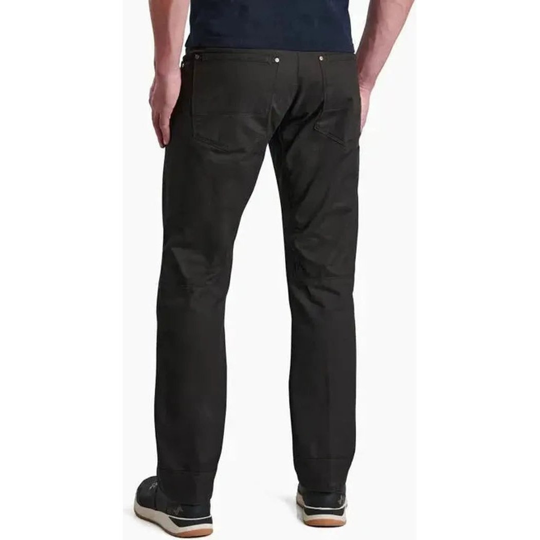 Back view of the Kuhl Men's Free Rydr in Espresso showing the straight fit and back pockets against a white background.