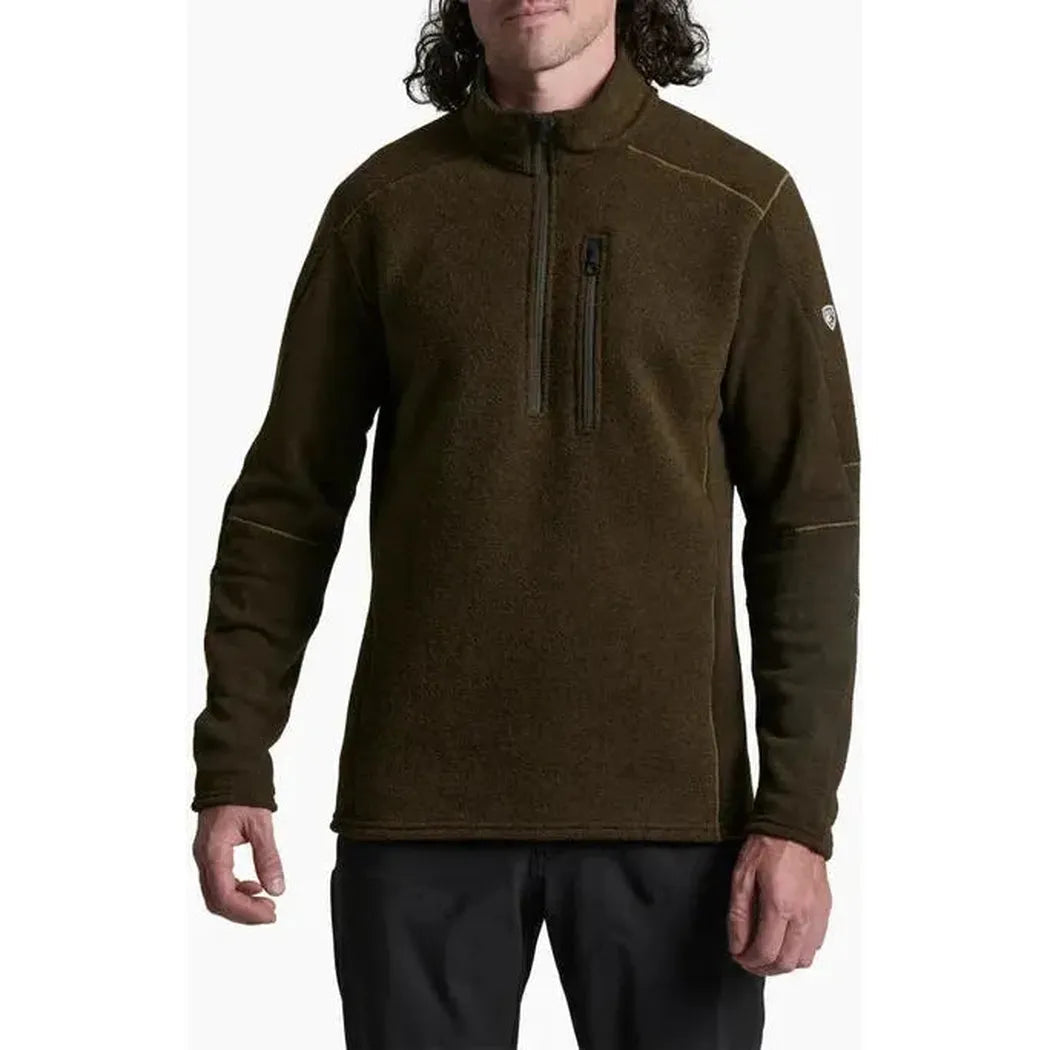 A front view of the Kuhl Men's Interceptr 1/4 Zip in Dark Roast showing the chest zip pocket and a model wearing it against a white background.