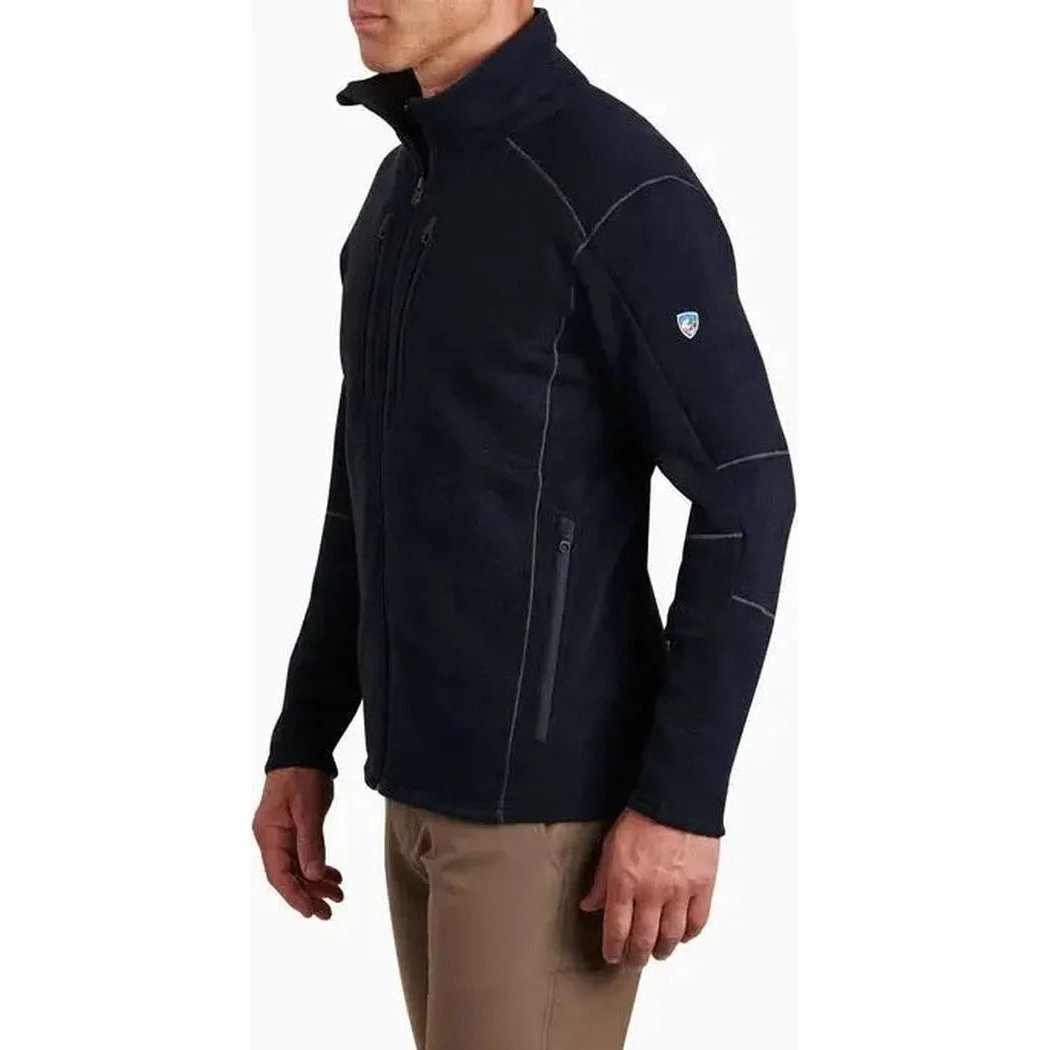Side view of the Kuhl Men's Interceptr Full Zip jacket in Mutiny Blue with zippered pockets and a small logo on the sleeve against a white background.
