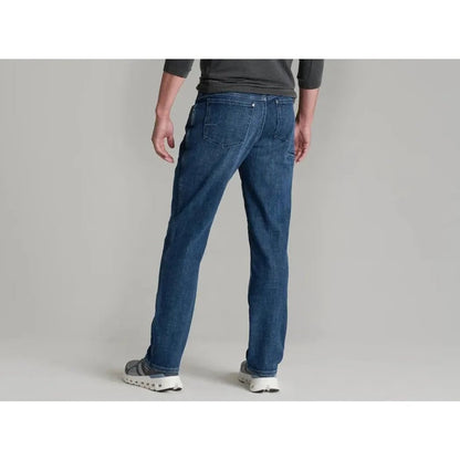 Back view of the Kuhl Men's Kontrol Denim Klassik in Medium Wash on a model against a light gray background.