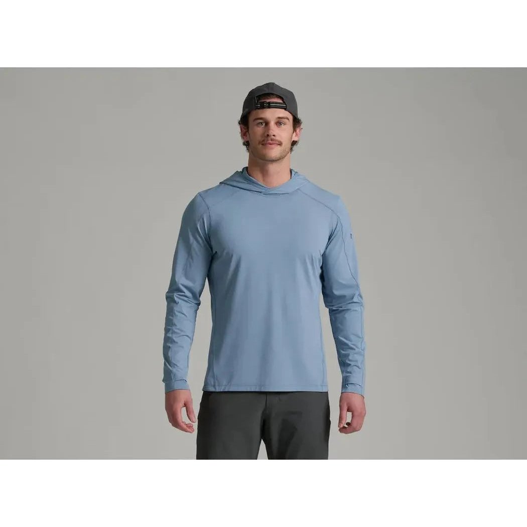 A front view of the Kuhl Men's Kovert Hoody in Mineral Blue on a model against a gray background.