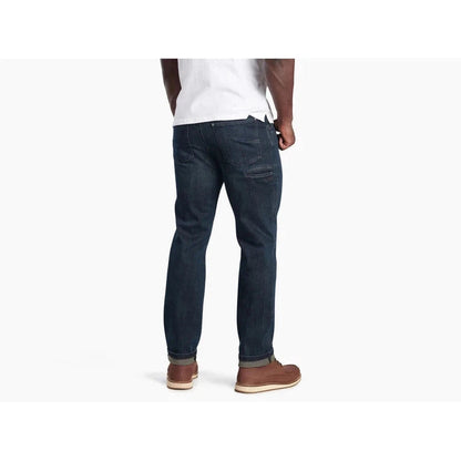 Back view of the Kuhl Men's Kuhl Denim in Midnight showing the back pocket and straight fit against a white background.