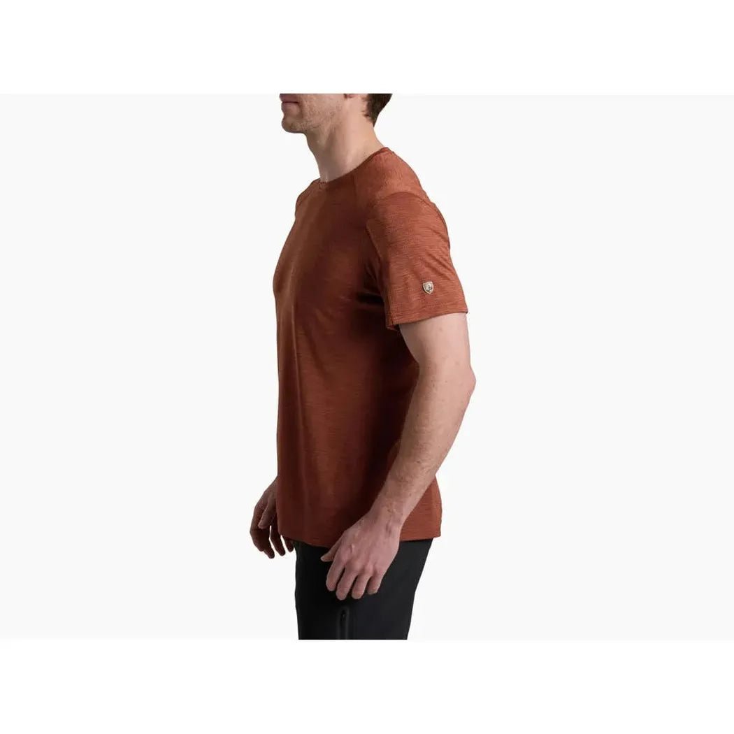 Side view of the Kuhl Men's KUHL Engineered T in Slickrock showing the small logo on the sleeve against a white background.