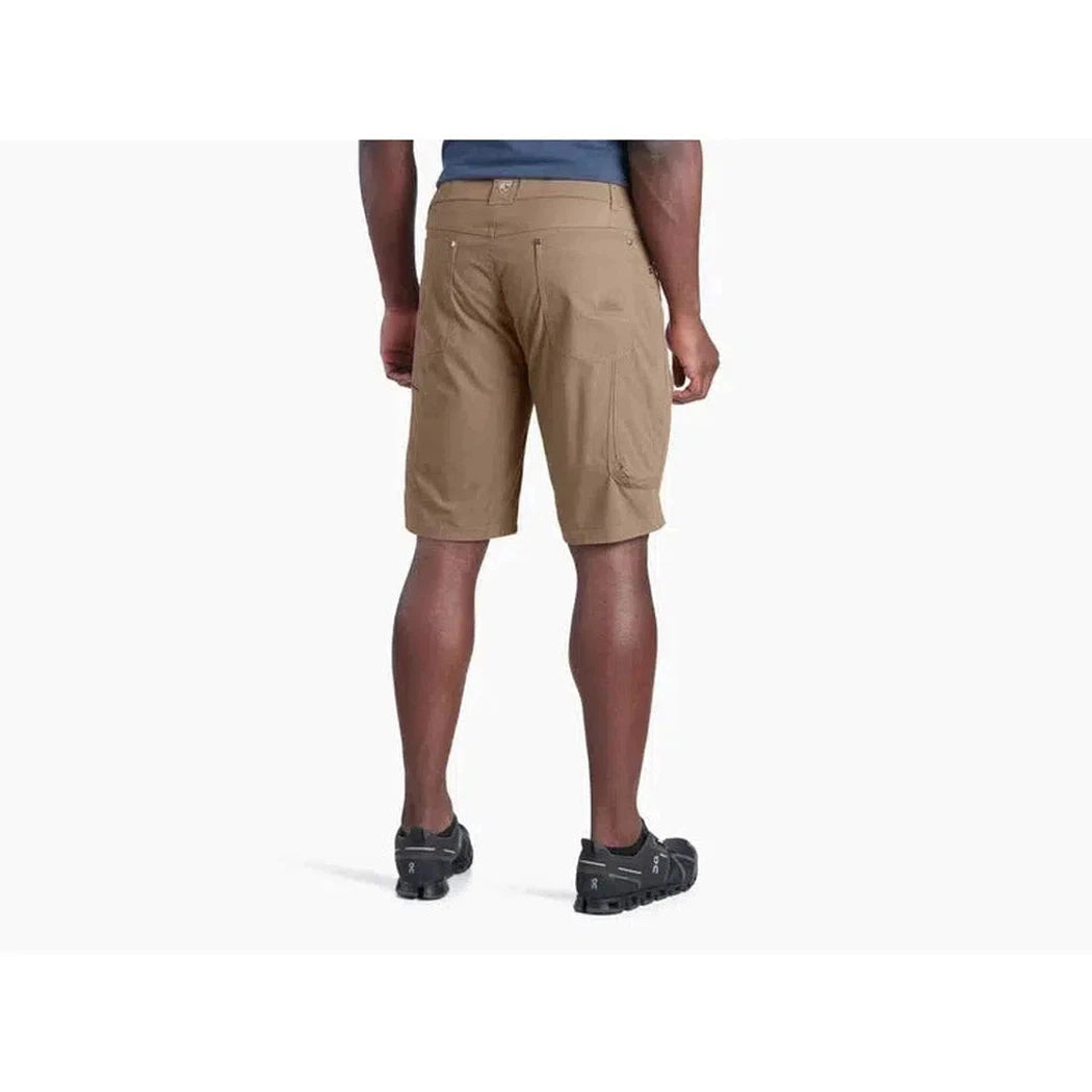Back view of the Kuhl Men's Radikl Short Inseam in Dark Khaki on a model against a white background.