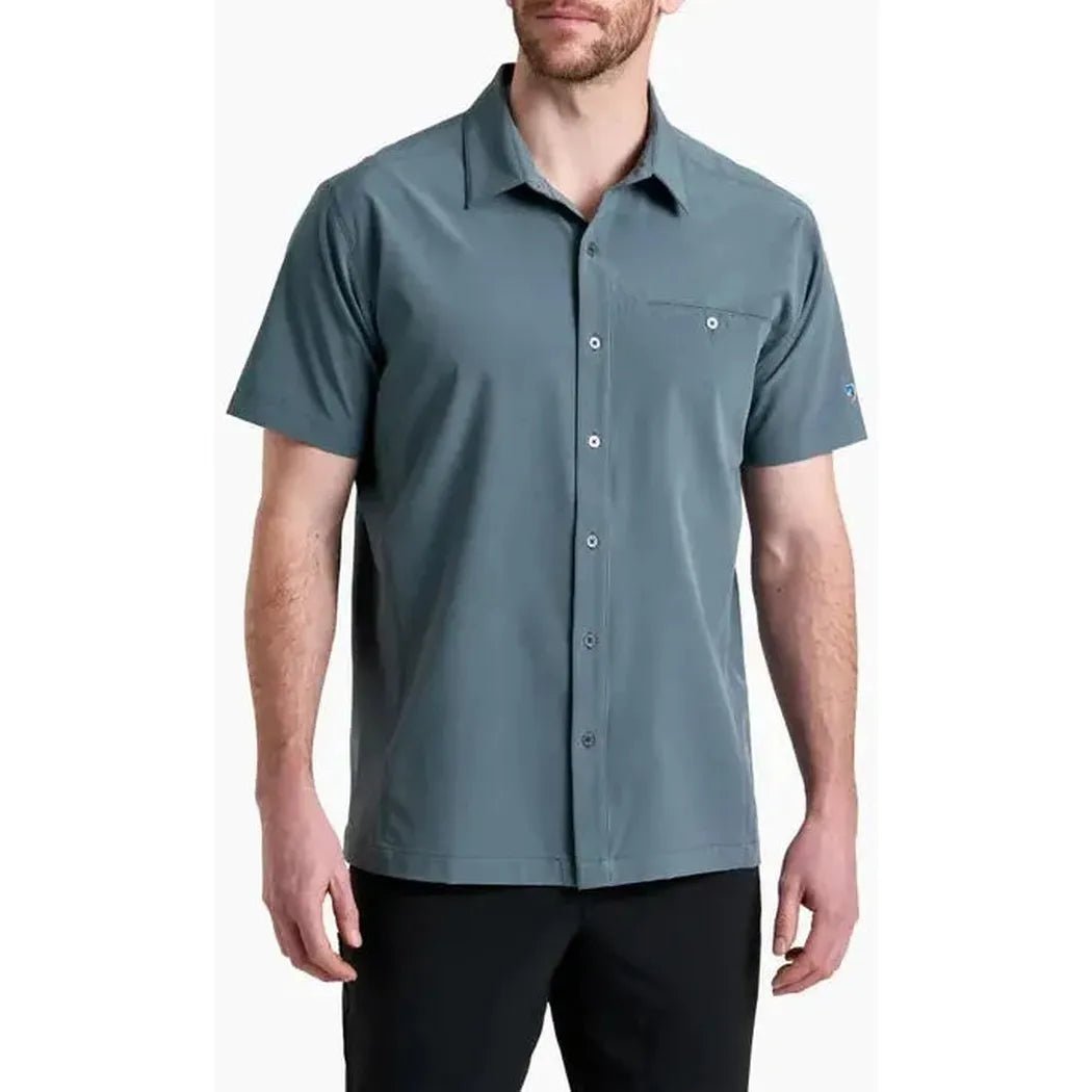 A front view of the Kuhl Men's Renegade Shirt in Charcoal Blue on a model against a white background.