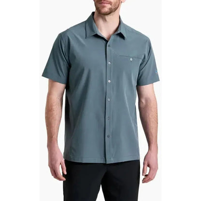 A front view of the Kuhl Men's Renegade Shirt in Charcoal Blue on a model against a white background.