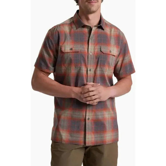 A front view of the Kuhl Men's Response short - sleeve shirt in Ember Red, showing chest pockets and a model wearing it against a plain background.