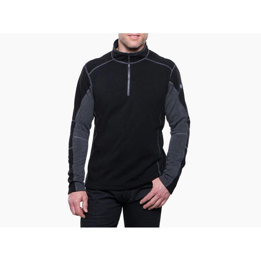 A front view of the Kuhl Men's Revel™ 1/4 Zip Sweater in Black/Steel on a model against a white background.