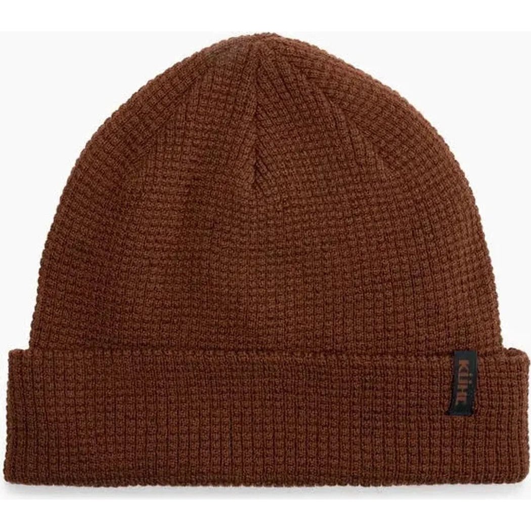 A front view of the Kuhl Rebel Thermal Beanie in Raven showing the ribbed cuff and brand tag on the right side against a white background.