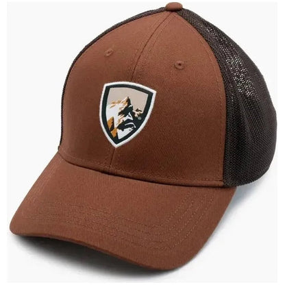 A front view of the Kuhl Trucker in Rustic Brick showing the mountain logo on the front panel and black mesh back against a white background.