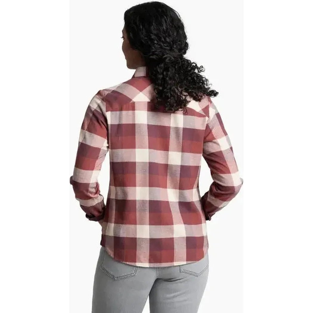 Back view of the Kuhl Women's Darcy Flannel in Cherrywood on a model wearing light gray pants against a white background.