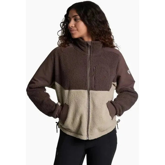 Side view of the Kuhl Women's Elixir Coffee jacket showing the front pockets and zipper against a white background.