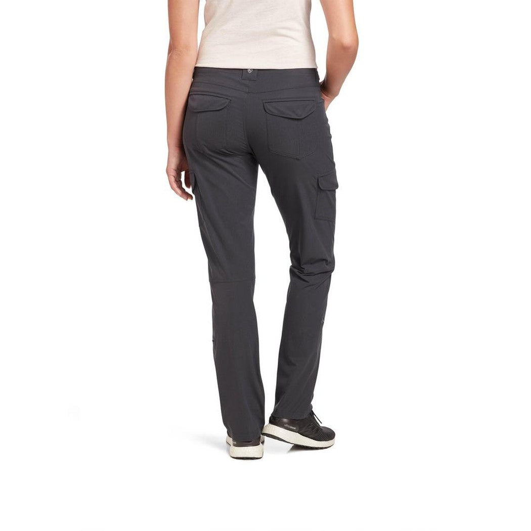 Back view of the Kuhl Women's Freeflex Roll-Up Pant in Fallow, showing cargo pockets and a white background.