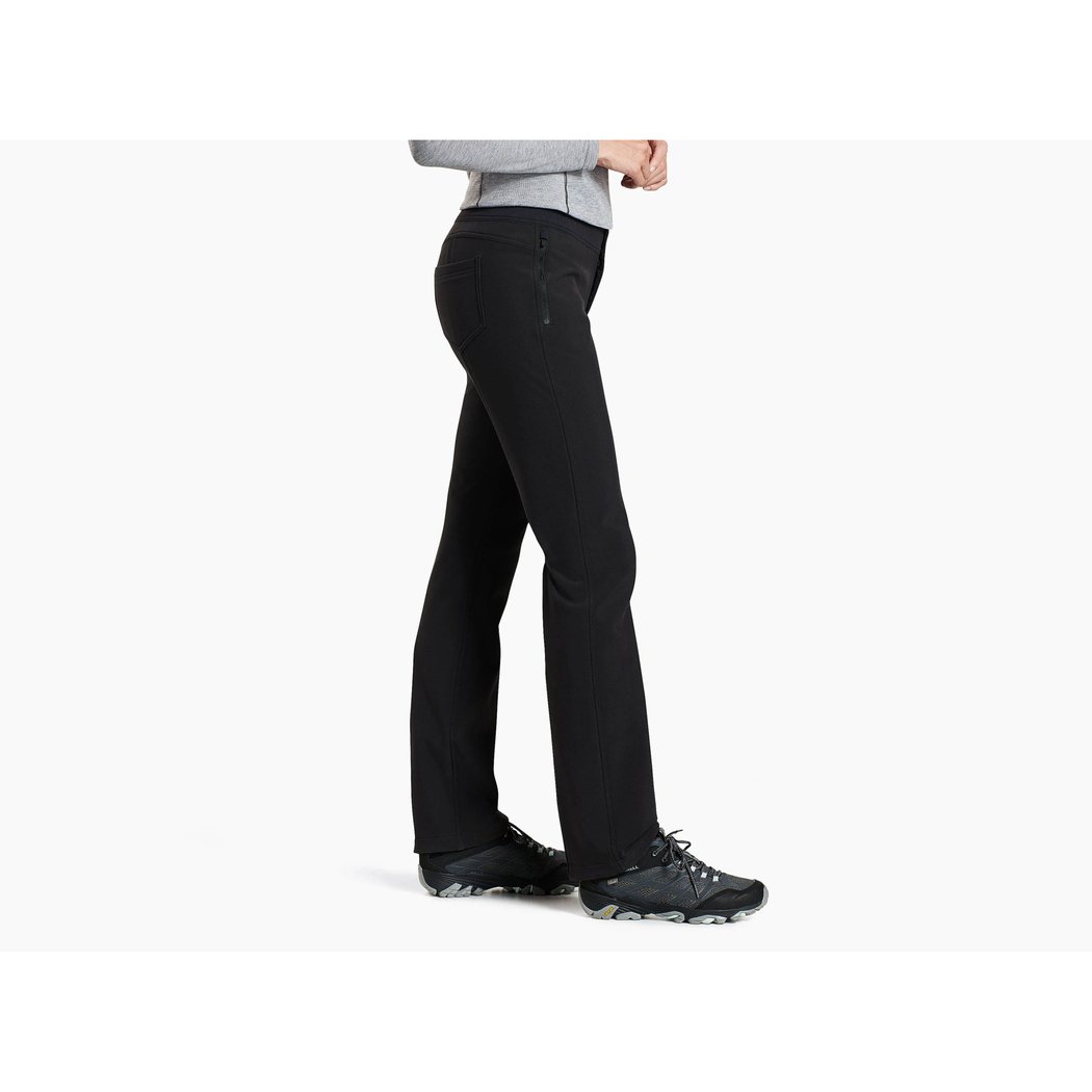 Side view of the Kuhl Women's Frost Softshell Pant in Raven showing the straight leg fit against a white background.