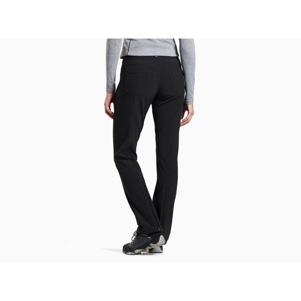 Back view of the Kuhl Women's Frost Softshell Pant in Raven showing the straight leg fit against a white background.