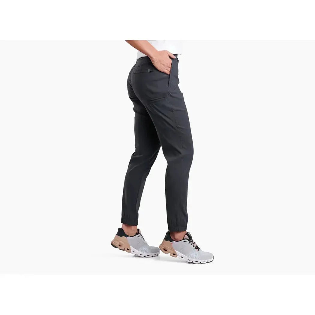 Side view of the Kuhl Women's Haven Joggr in Black showing the model wearing them against a white background.