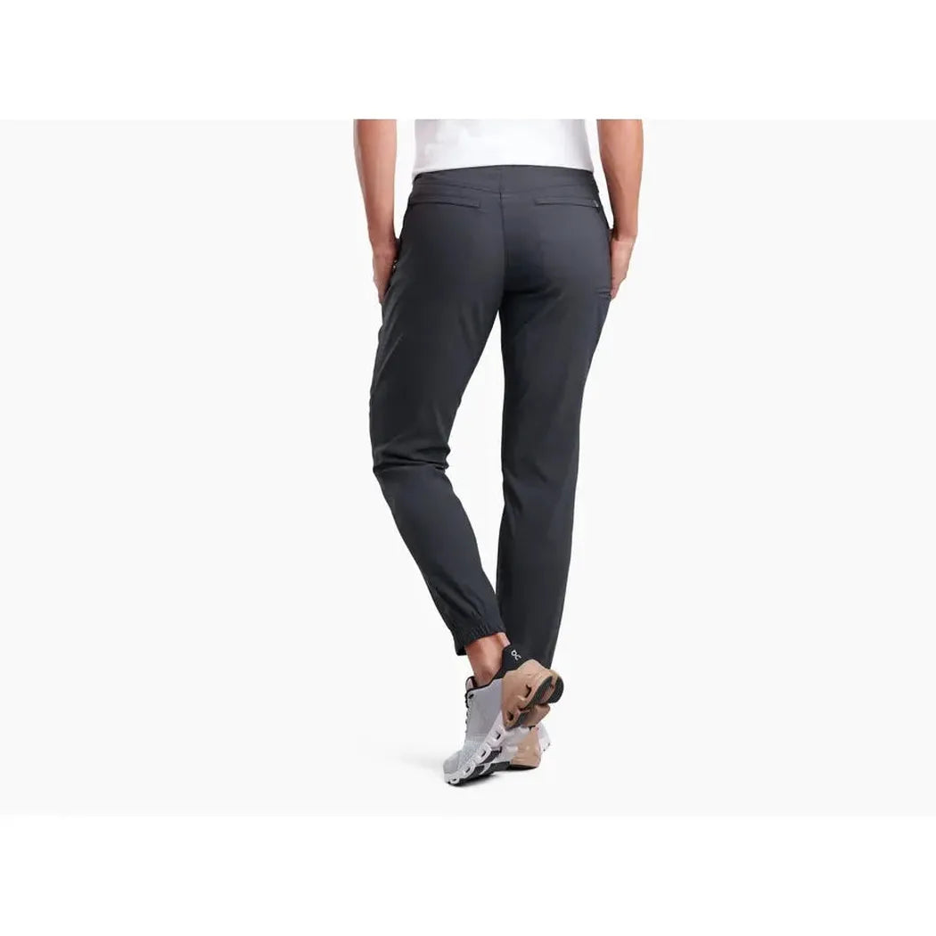 Back view of the Kuhl Women's Haven Joggr in Black showing the tapered fit and model wearing them against a plain white background.
