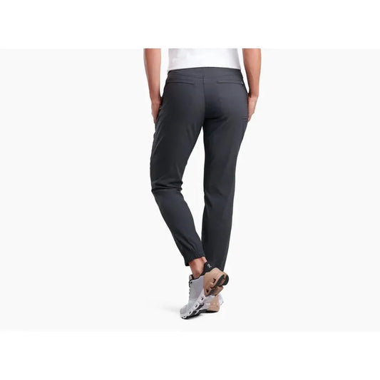 Back view of the Kuhl Women's Haven Joggr in Black showing the tapered fit and model wearing them against a plain white background.