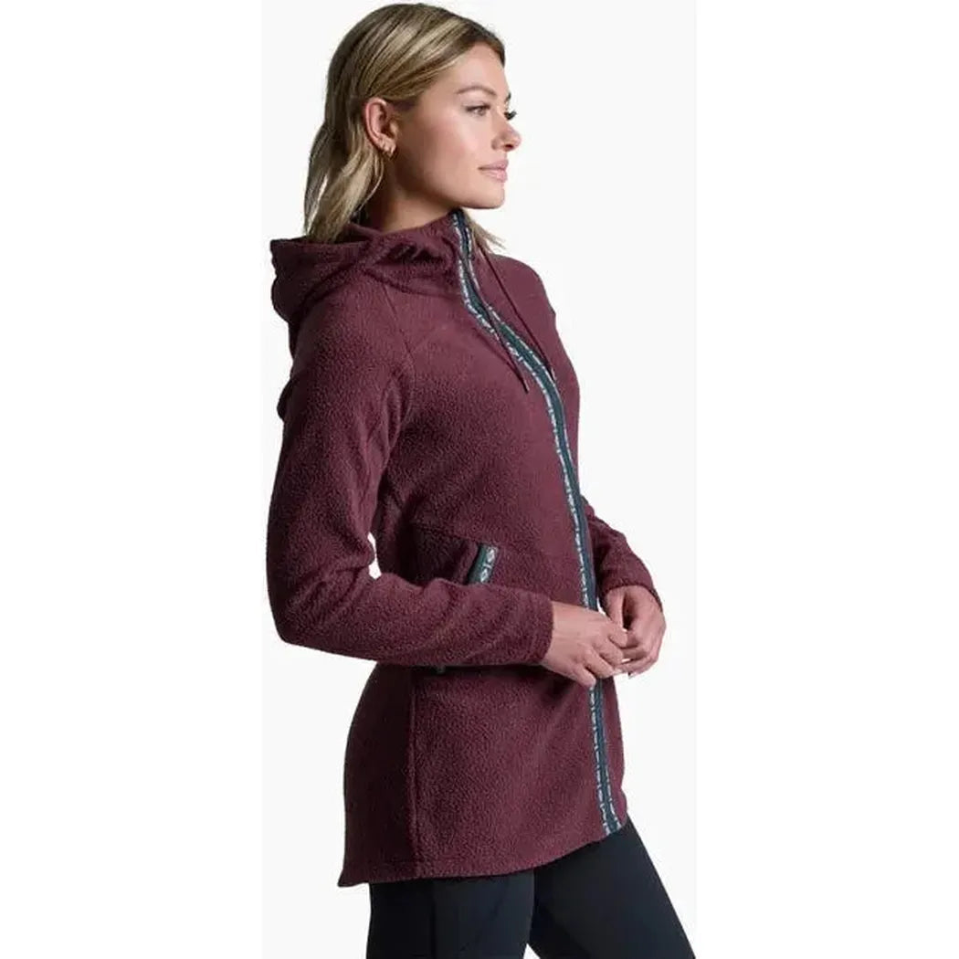 Side view of the Kuhl Women's Hygge Long Sleeve in Raisin showing the hood and zipper against a white background.