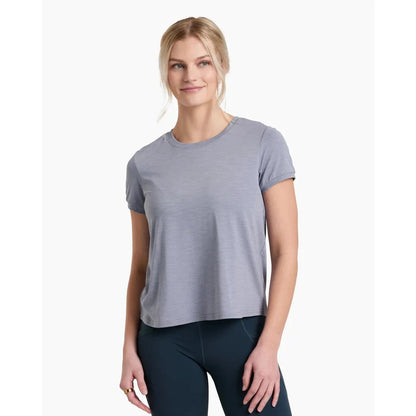 A front view of the Kuhl Women's Inspira Short Sleeve in Alpine Lake on a model wearing dark leggings against a white background.