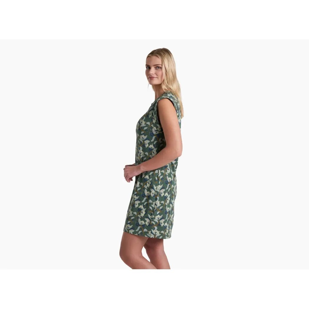 Side view of the Kuhl Women's Lyra Tee Dress in Smoked Pine Print on a model against a white background.