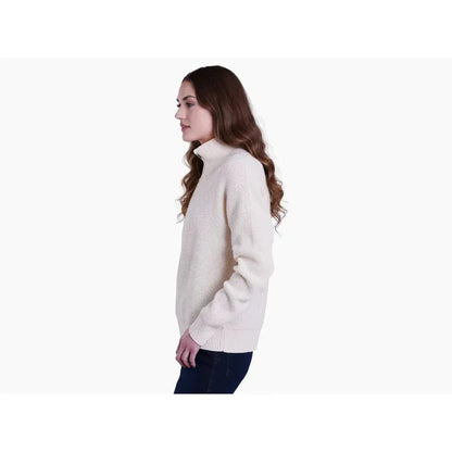Side view of the Kuhl Women's Norda 1/4 Zip Sweater in Stone on a model against a white background.