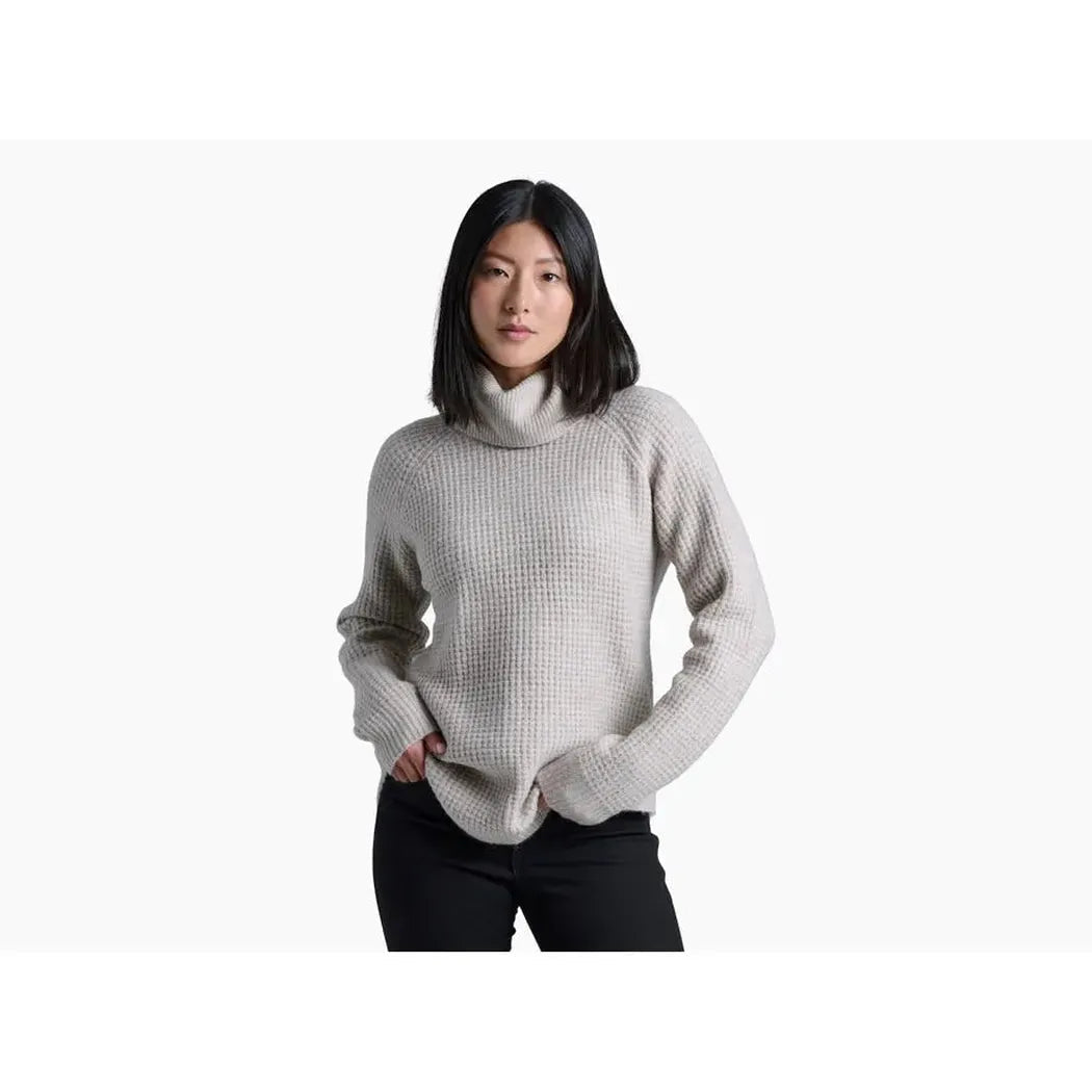A front view of the Kuhl Women's Sienna Sweater in Cherrywood on a model against a white background.