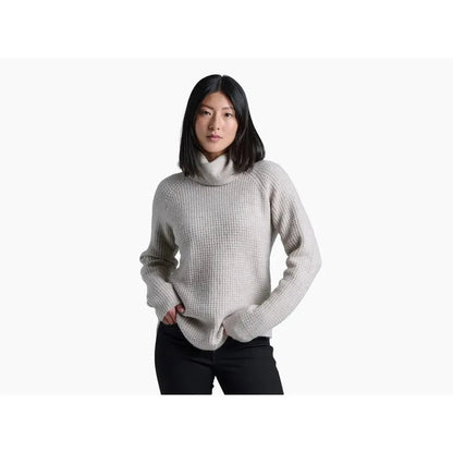 A front view of the Kuhl Women's Sienna Sweater in Cherrywood on a model against a white background.