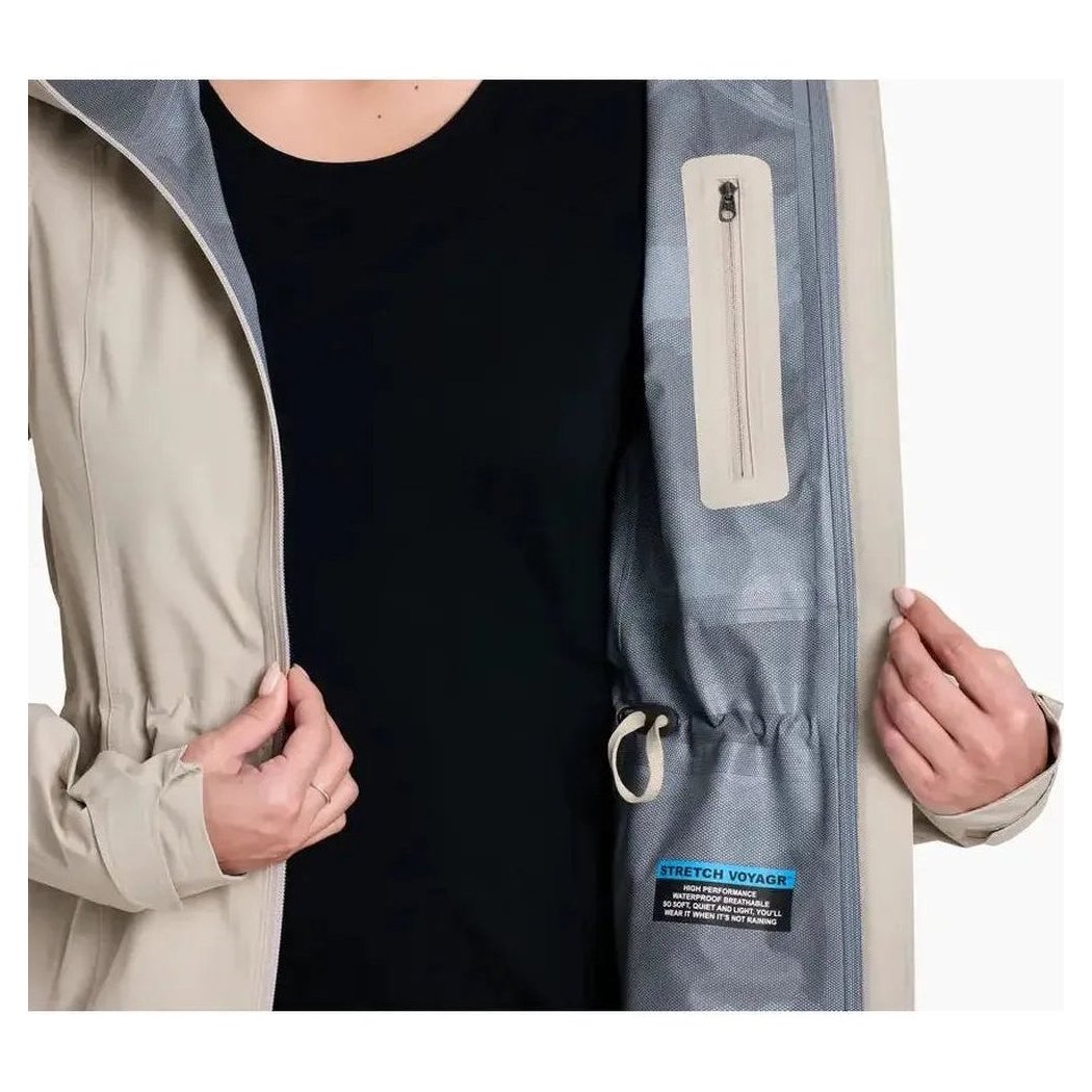 Side view of the Kuhl Women's Stretch Voyagr Jacket in Silverstone showing the interior lining and zipper pocket against a white background.