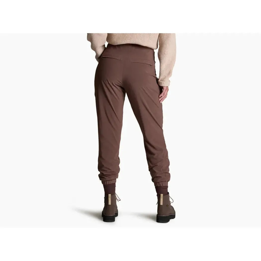 Back view of the Kuhl Women's Vantage Lined Pant in Coffee showing the high waist and cuffed ankles on a model against a white background.