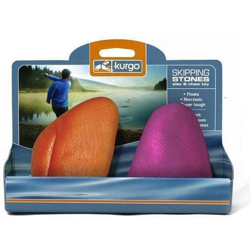 A front view of the Kurgo Skipping Stones - 2 Pack in Assorted colors showing the floating, non-toxic chew toy against a lake background.