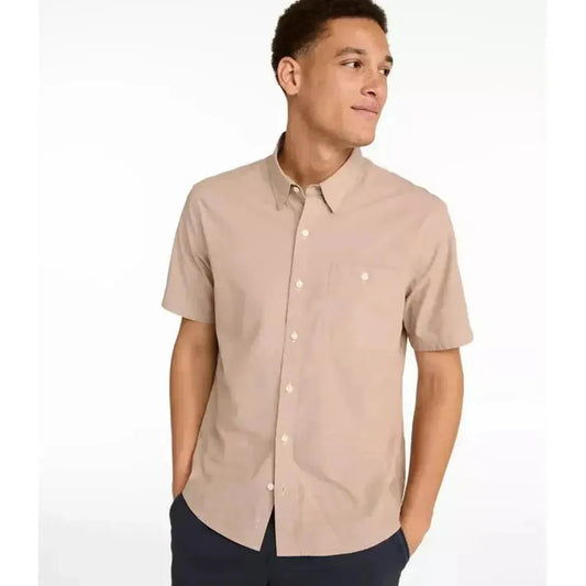 A front view of the L.L.Bean Men's Comfort Stretch Performance Chambray Shirt in Camel Brown with a model wearing it against a white background.
