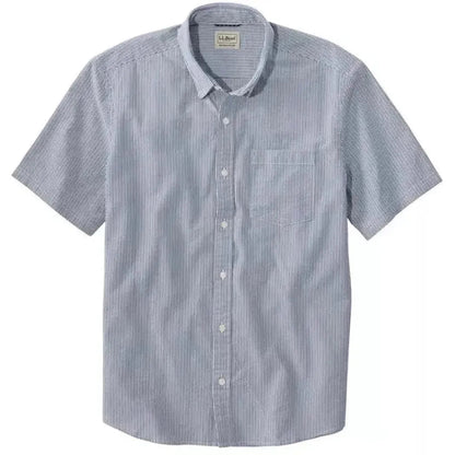 A front view of the L.L.Bean Men's Comfort Stretch Performance Seersucker Shirt in Deep Blue with a single chest pocket and white buttons.