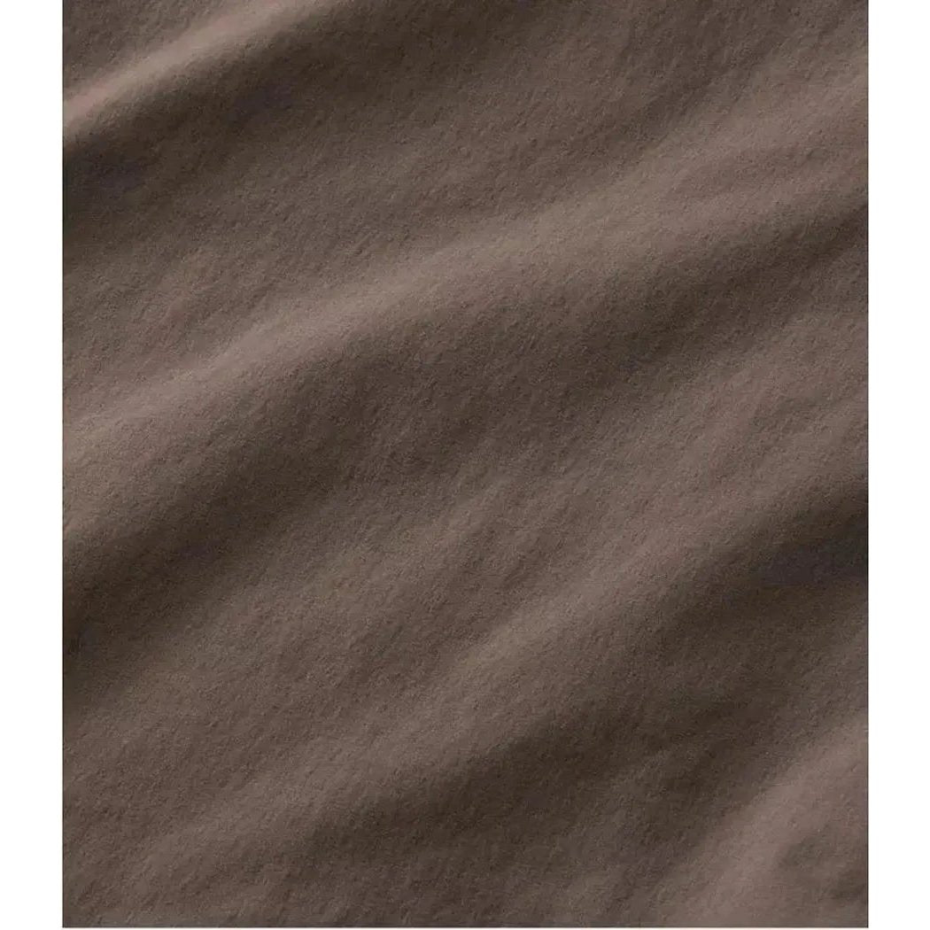 The L.L.Bean Men's Cresta Hiking Zip Off Pant in Dark Cinder shows the fabric texture and natural wrinkles from the camera angle.