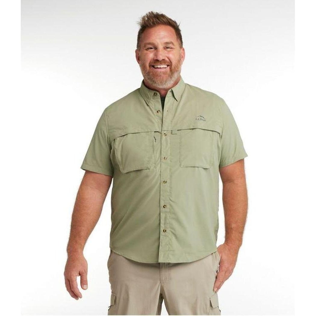 A man wearing the L.L.Bean Men's Tropicwear Shirt Short Sleeve in Dusty Sage stands against a plain white background.