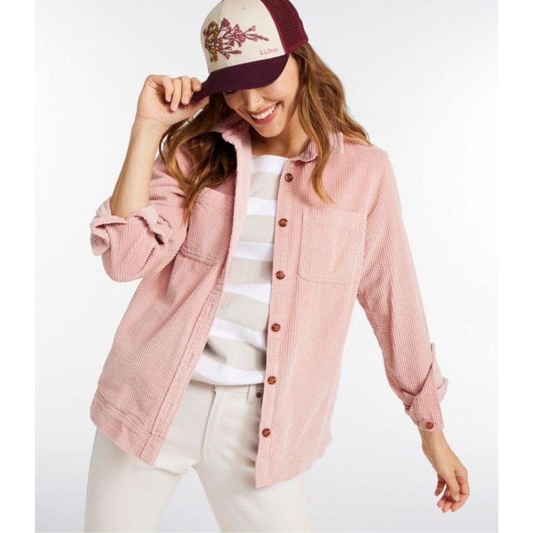 A woman wearing the L.L.Bean Women's Comfort Corduroy Relaxed Shirt Long Sleeve in Carbon Navy poses against a white background.