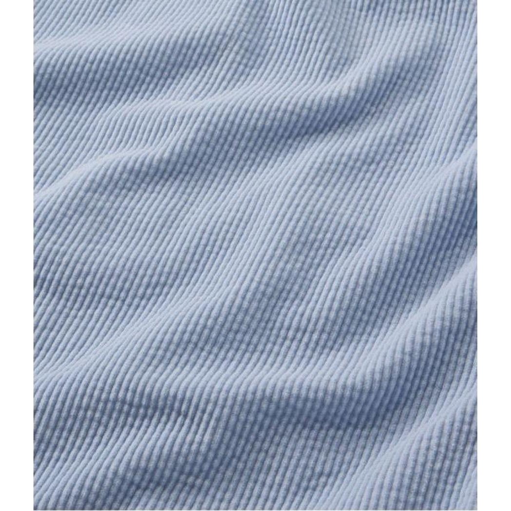 A close-up of the L.L.Bean Women's Comfort Corduroy Relaxed Shirt Long Sleeve in Carbon Navy showing the ribbed texture and soft fabric.