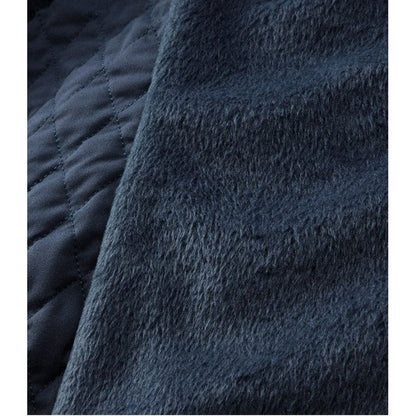 A close-up of the L.L.Bean Women's Regular Fleece Lined Primaloft Jacket in Carbon Navy showing the quilted and fleece-lined fabric.