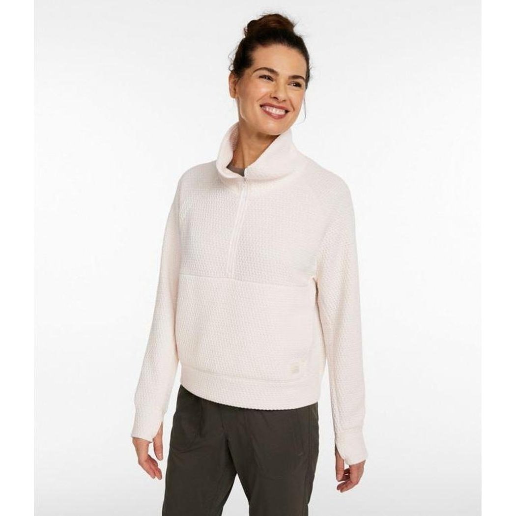 A woman wearing the L.L.Bean Women's Ridgeknit Half-Zip Pullover in Sailcloth stands against a plain white background.