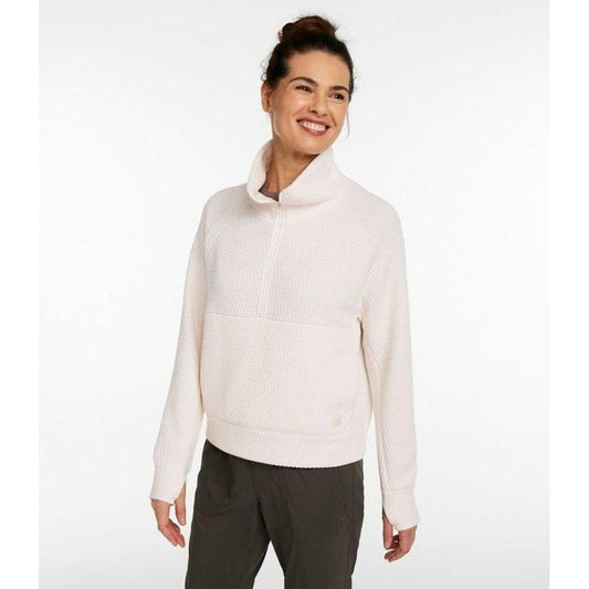 A woman wearing the L.L.Bean Women's Ridgeknit Half-Zip Pullover in Sailcloth stands against a plain white background.